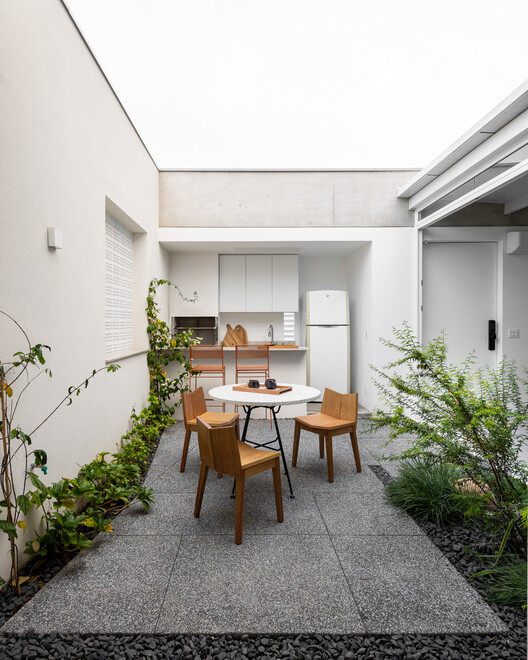 Casa Yano / Peninsula Arquitetura - fotografía de interiores, restaurante, hormigón, patio interior