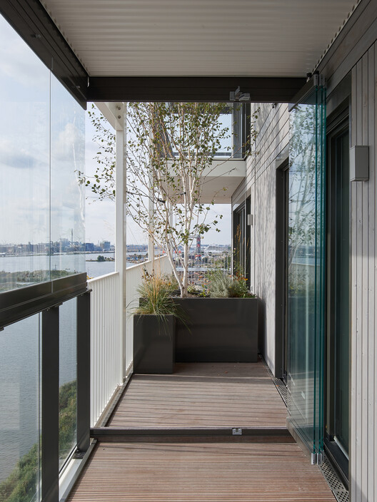 Stories Residential Building / Olaf Gipser Architects - Interior Photography, Balcony, Glass, Deck