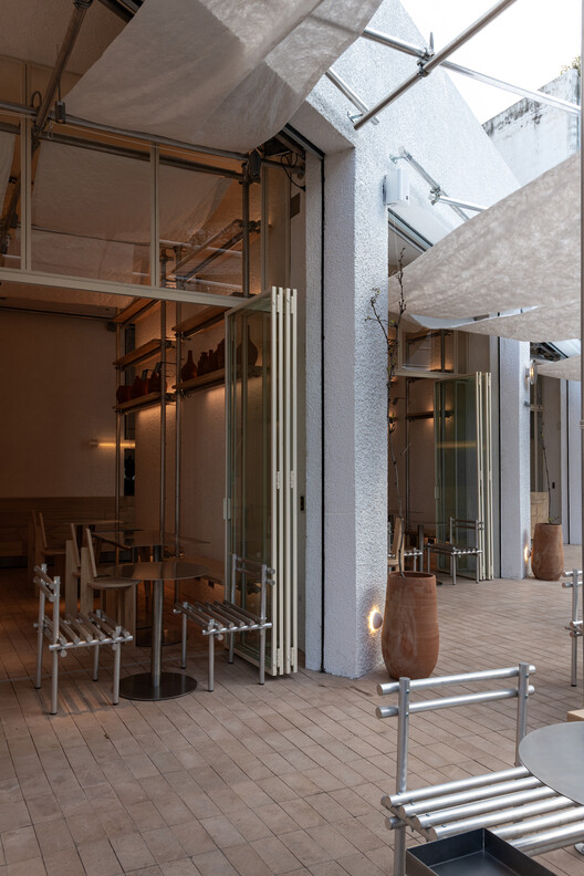 Local Tavlón / MMCV - Fotografía interior, Vidrio, Sillas