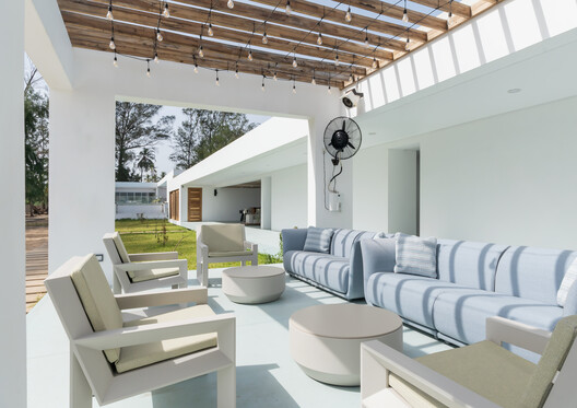 Fowóralé II. - Beach House / Oshinowo Studio - Interior Photography, Living Room, Chair, Concrete, Patio