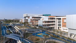 Expansion and Renovation of Primary School & Urban Infrastructure Multi-system Complex / Atelier Archmixing