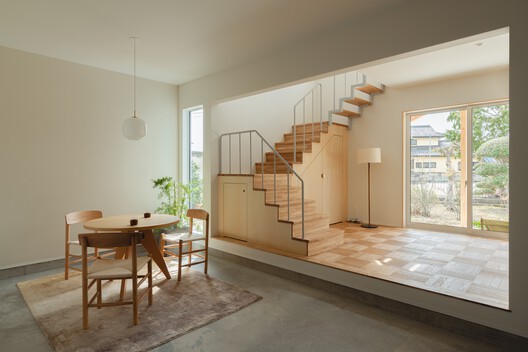 A Life Where Spaces Connect / Architrip Inc. A Life Where Spaces Connect / Architrip Inc. - Interior Photography, Dining room, Wood, Stairs, Handrail