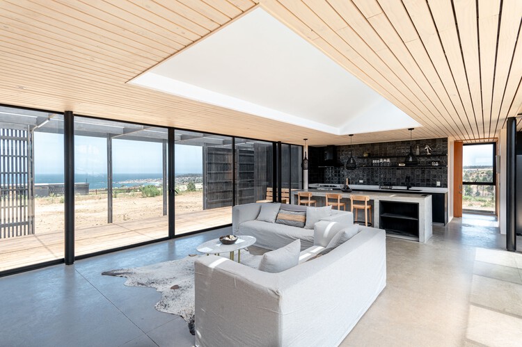 Casa Huaquén / COLECTIVO - Fotografía de interiores, sala, madera, fijación de vigas