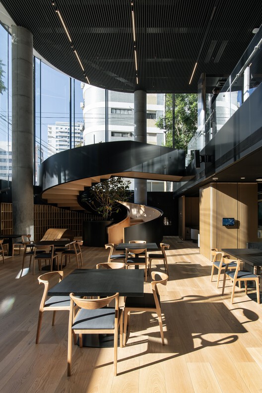 VILO Tower / Rafael Viñoly Architects VILO Tower / Rafael Viñoly Architects - Interior Photography, Dining room, Wood, Lighting, Chair, Glass