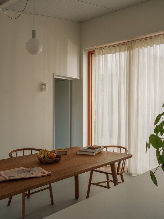 Zero-Carbon Eco Home / Bindloss Dawes Zero-Carbon Eco Home / Bindloss Dawes - Interior Photography, Dining room, Wood, Chair