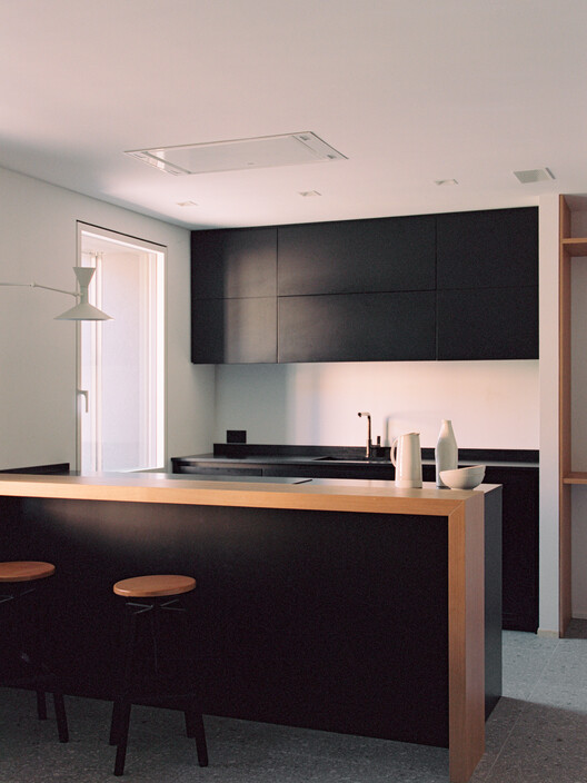 The Gray Race House / Rinaldo Del Nero The Gray Race House / Rinaldo Del Nero - Interior Photography, Kitchen, Wood, Countertop, Lighting, Chair, Glass