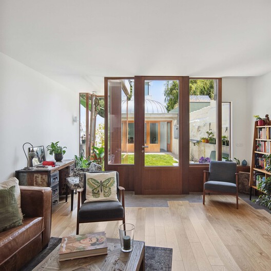 Casa Cacheux-Panciotto / Alessandro Pepe Arquitecto - Fotografia de Interiores, Sala de Estar, Madeira, Mesa, Cadeira, Porta