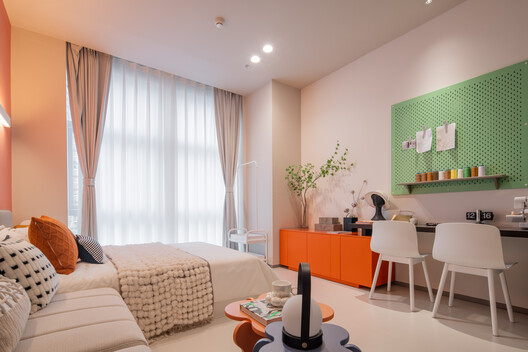 青核INNNG国际人才社区 / 朱小地工作室 + 北京市建筑设计研究院 青核INNNG国际人才社区 / 朱小地工作室 + 北京市建筑设计研究院 - 室内图, 卧室, 床, 椅子