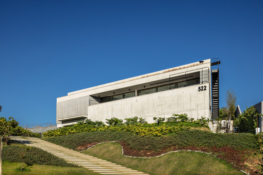 Casa Kûara / Obra Arquitetos + NNArq - Fotografía exterior, Concreto