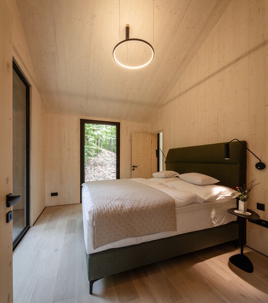 Monolith Lodge / Pyxis Nautica + Hello Wood - Interior Photography, Bedroom, Wood