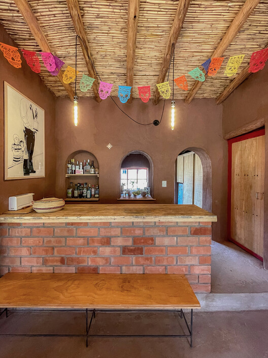 Centro Comunitario Quincho Bernarda / Estudio MACAA (Misión de Arquitectura, Construcción y Arte en los Andes) - fotografía de interiores, madera, sillas