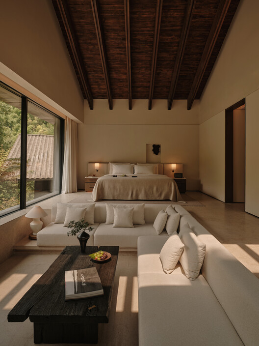 ZOLAND·Emei, Resort  / Studio J. Bridgland - Interior Photography, Living Room, Sofa, Lighting, Bed