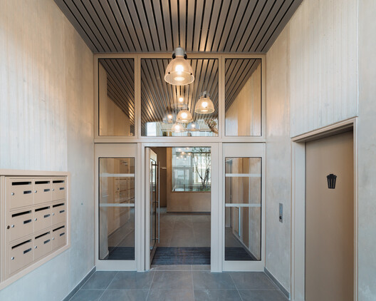24 Social Housing Units / Prinvault Architectes - Interior Photography, Wood, Glass, Door