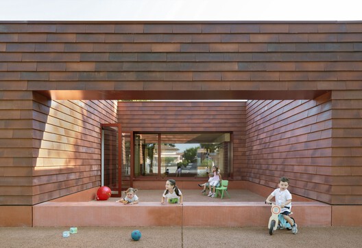 Jardín infantil Kinder Rain / AACM - Atelier Architettura Chinello Morandi - Fotografía exterior, Madera, Ladrillo