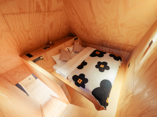 Red Cabin / Wiki World + Advanced Architecture Lab - Interior Photography, Wood, Bedroom