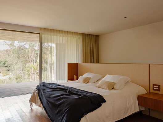JL Dam House / Garbin Arquitetos - Interior Photography, Bedroom, Bed, Wood, Lighting