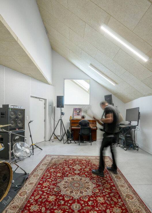 Cultural and Musical Space / TRACKS - Interior Photography, Lighting, Chair