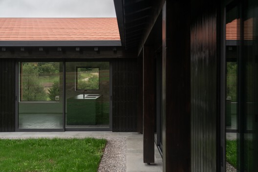 Casa Reversa / Héctor Navarro + ARKHITEKTON - Fotografía exterior, Madera