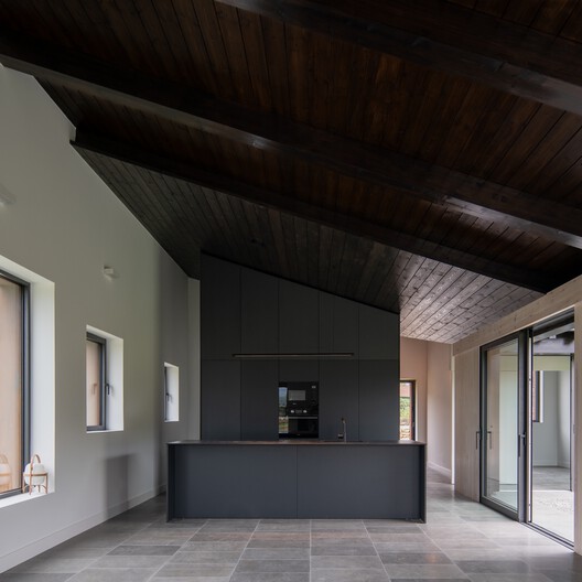 Casa Reversa / Héctor Navarro + ARKHITEKTON - Fotografía interior, Cocina, Madera, Iluminación, Vidrio, Fijación Vigas