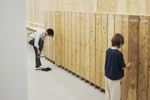 Uchida Shoten New Head Office / Schemata Architects + Jo Nagasaka - Interior Photography, Closet, Wood