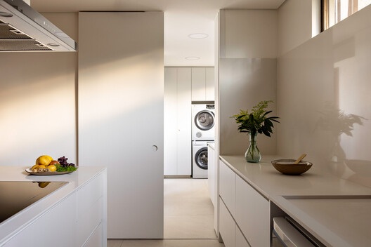 Moiré Apartment / CODA Arquitetura - Interior Photography, Wood, Lighting, Countertop, Kitchen, Glass