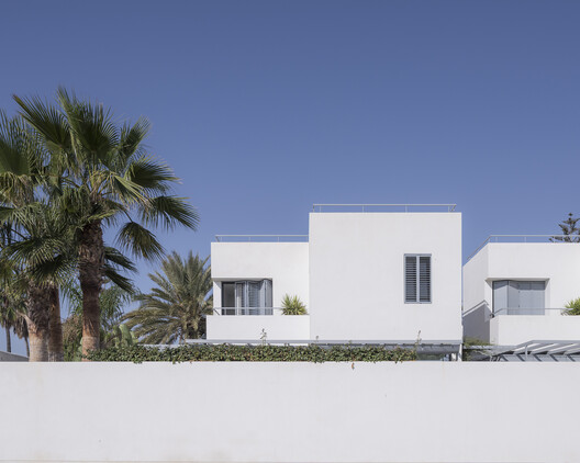 Casas Puerto Rey / tresunouno Casas Puerto Rey / tresunouno - Fotografía exterior, Balcón