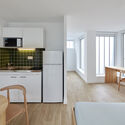 Parking Lot into Social Housing Residence / NZI Architectes - Interior Photography, Social Housing, Kitchen, Balcony, Chair