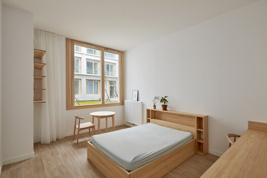 Parking Lot into Social Housing Residence / NZI Architectes - Interior Photography, Bedroom, Wood, Bed, Chair