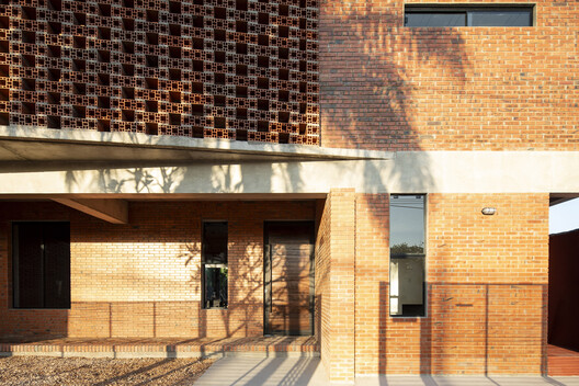 Reforma Casa Camilo / Biocons Arquitectos - Fotografía exterior, Madera, Ladrillo
