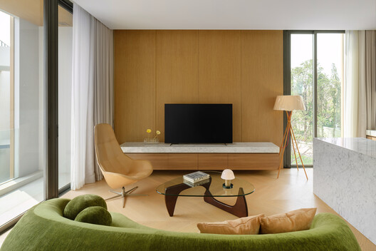 Axis of Growth House / Elemental Living - Interior Photography, Living Room, Wood, Lighting, Sofa, Chair, Table