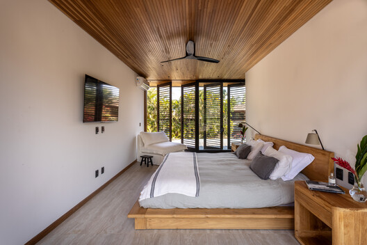 JV Residence / Pitta Arquitetura JV Residence / Pitta Arquitetura - Interior Photography, Bedroom, Wood, Bed, Chair