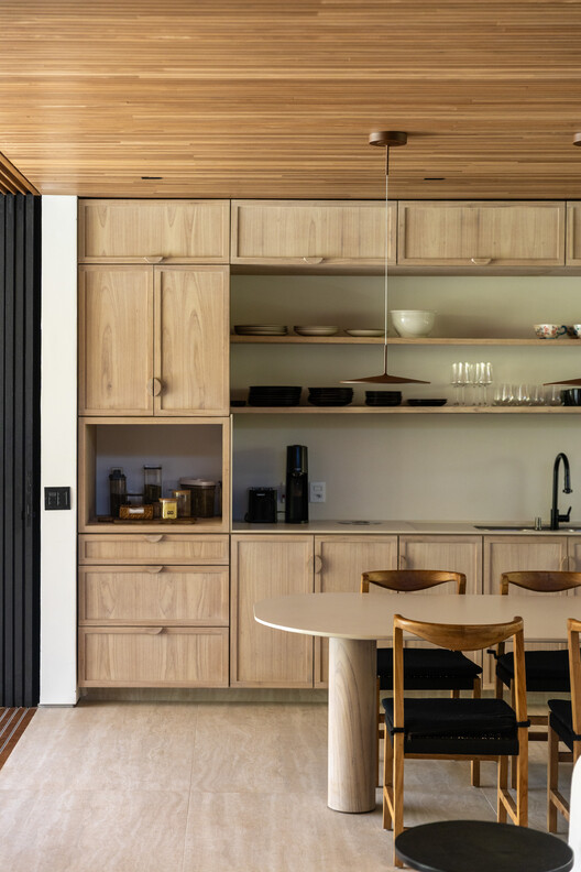 JV Residence / Pitta Arquitetura JV Residence / Pitta Arquitetura - Interior Photography, Kitchen, Wood, Lighting, Countertop, Table