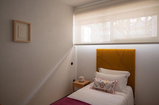 Renovation Casa d'Abreu Neto - Siza's First Work / Álvaro Siza Vieira - Interior Photography, Bedroom, Wood, Bed, Lighting