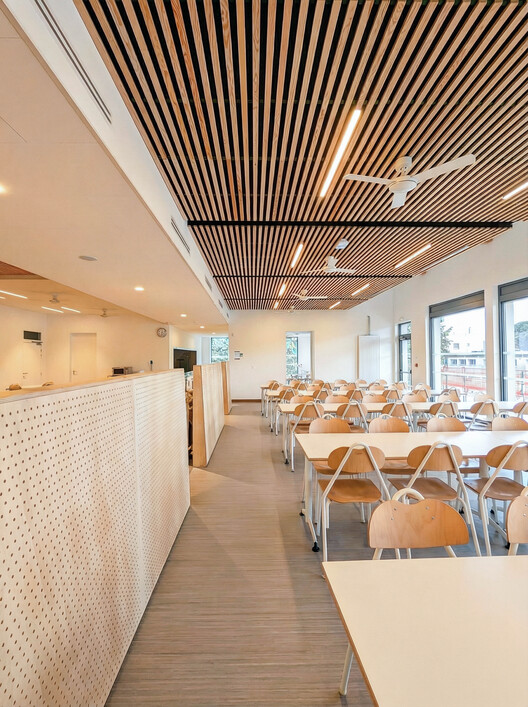 Voltaire College / NM2A - Interior Photography, Wood, Chair