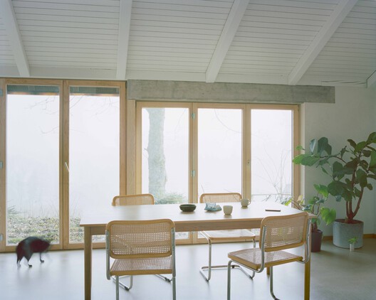 Family Villa / Noue Studio Family Villa / Noue Studio - Interior Photography, Dining room, Wood, Chair, Table