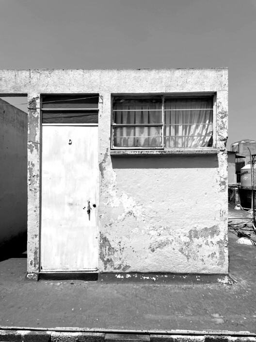 Conjunto Habitacional PETÉN / REIMS 502 - Fotografía exterior, Puerta, Concreto