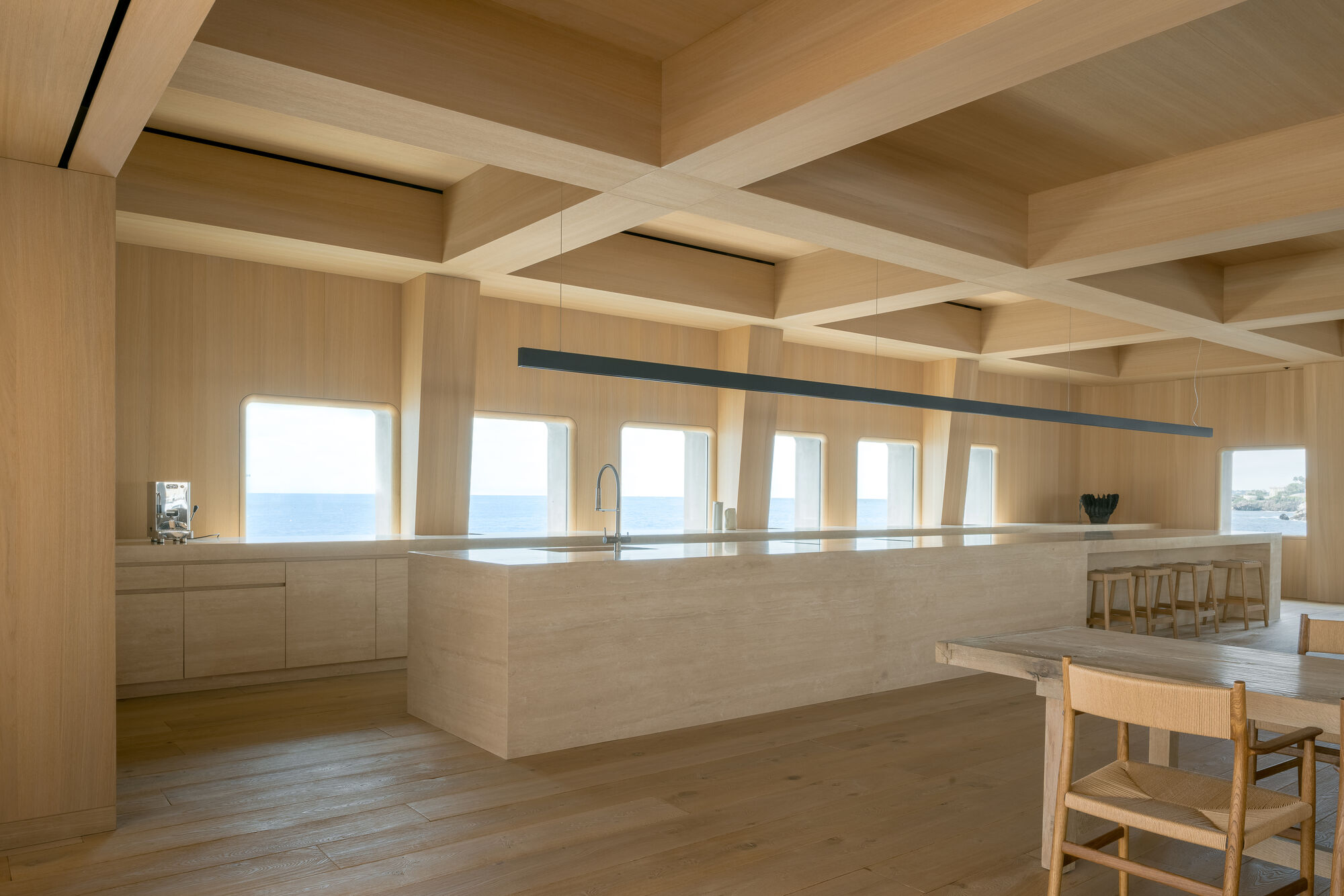 Gallery of Transforming a Concrete Shell into a Wooden Interior Shaped ...