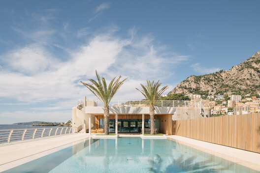 Transforming a Concrete Shell into a Wooden Interior Shaped by the Sea - Image 8 of 15