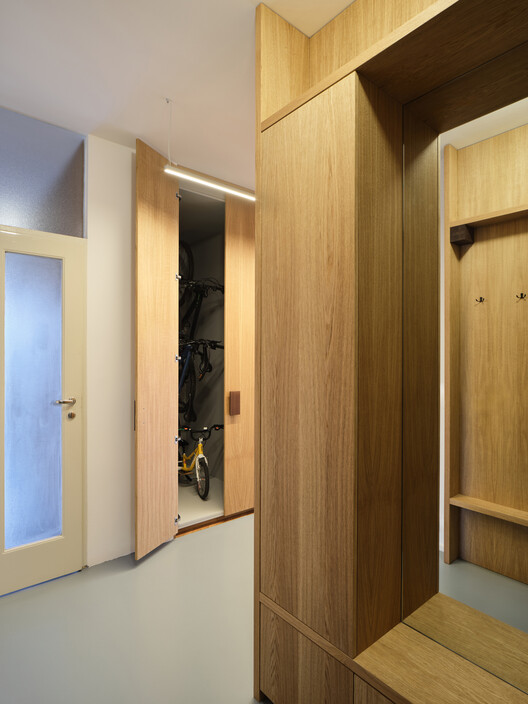 Corner Apartment / Prokop Hartl - Interior Photography, Closet, Wood, Lighting, Door, Glass