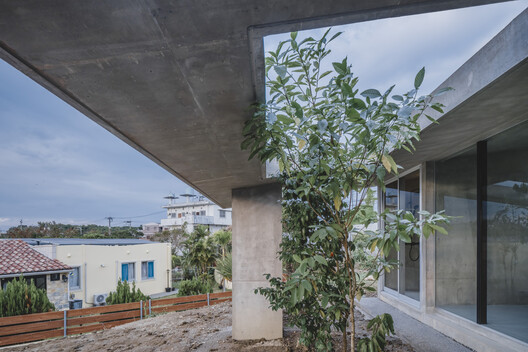 Overlap no Ma House / IGArchitects - Exterior Photography, Concrete