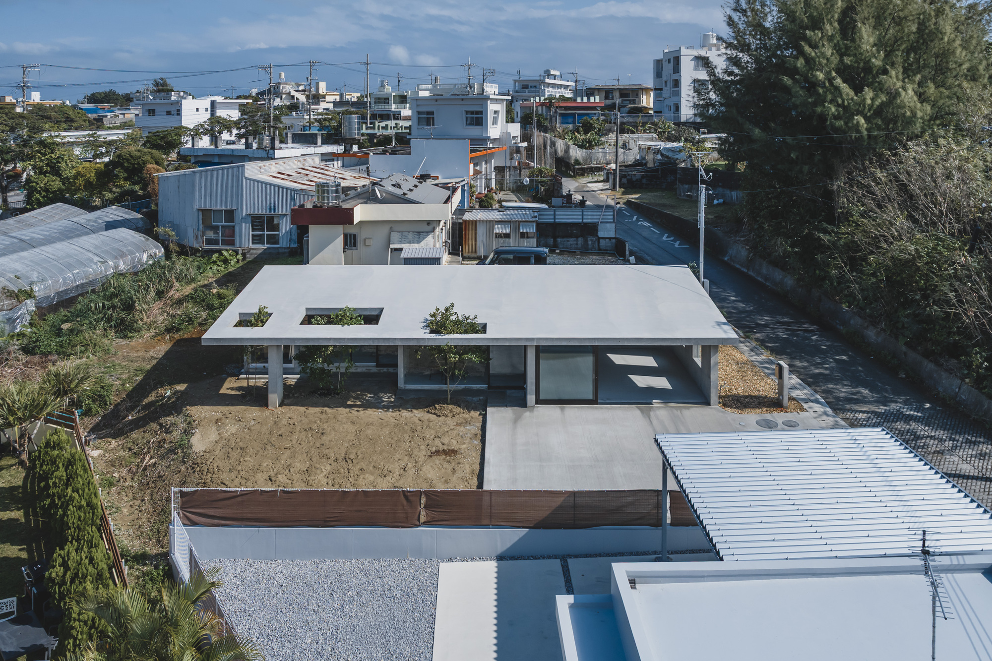 Overlap no Ma House / IGArchitects