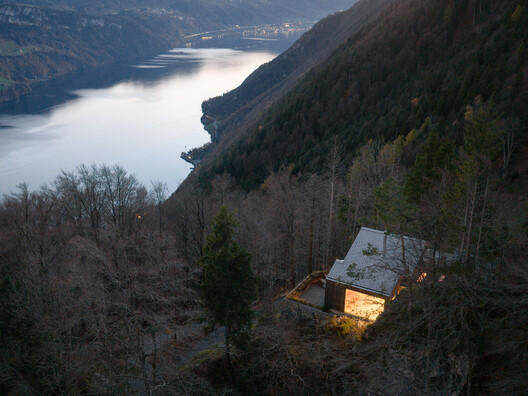 Swiss Alpine Cabin Reconstruction / Guča arch. - Exterior Photography, Forest, Waterfront