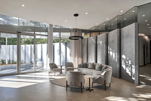 Ivory Coast Embassy / GLH Architects Ivory Coast Embassy / GLH Architects - Interior Photography, Living Room, Glass, Chair