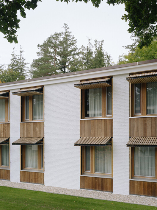 Mennorode Hotel and Conference Center - Phase I. / Namelok - Exterior Photography, Wood, Balcony