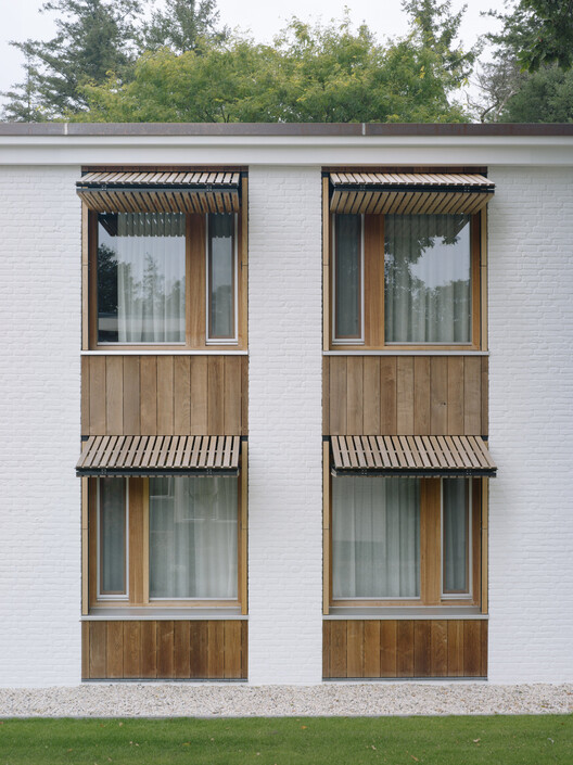 Mennorode Hotel and Conference Center - Phase I. / Namelok - Exterior Photography, Wood, Balcony