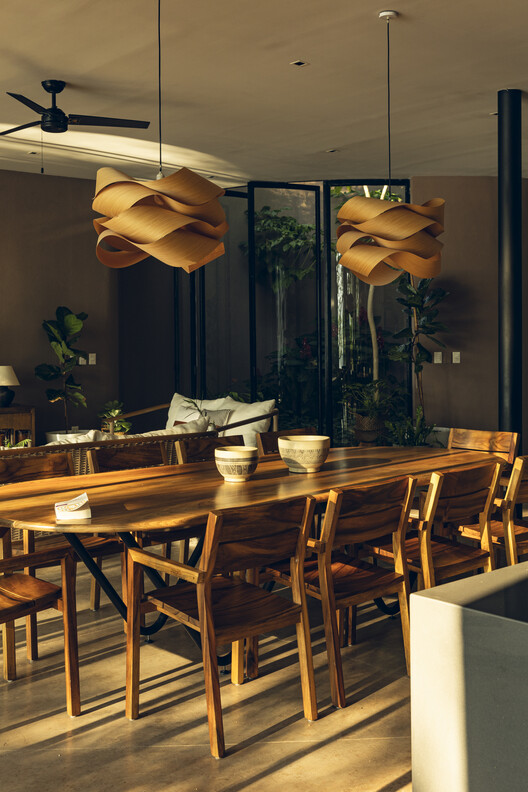 Santa María del Oro House / Mauricio Ceballos X Architects Santa María del Oro House / Mauricio Ceballos X Architects - Interior Photography, Dining room, Wood, Lighting, Chair
