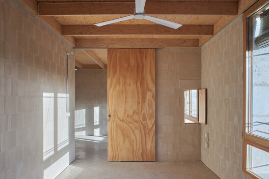 Ten Social Housing Units in Santa Margalida, Mallorca / Javier Gavín + Siddartha Rodrigo + Juan Moreno + DATAAE - Interior Photography, Wood, Beam