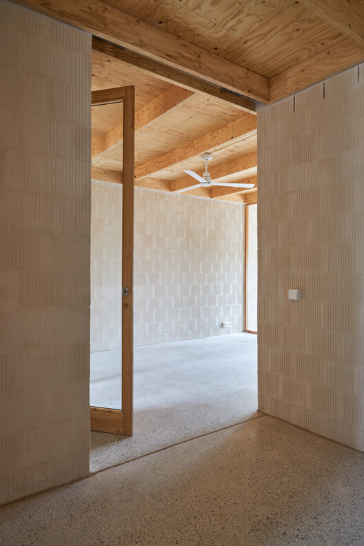 Ten Social Housing Units in Santa Margalida, Mallorca / Javier Gavín + Siddartha Rodrigo + Juan Moreno + DATAAE - Interior Photography, Wood