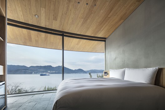 Not a Hotel Setouchi Resort / BIG - Interior Photography, Bedroom, Coast, Balcony