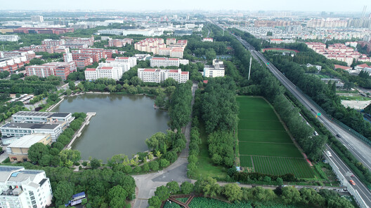 Shanghai Jiao Tong University Student Service Center / TJAD/Zeng Qun Architecture Design Studio Shanghai Jiao Tong University Student Service Center / TJAD/Zeng Qun Architecture Design Studio - Exterior Photography, Waterfront, Aerial View Photography
